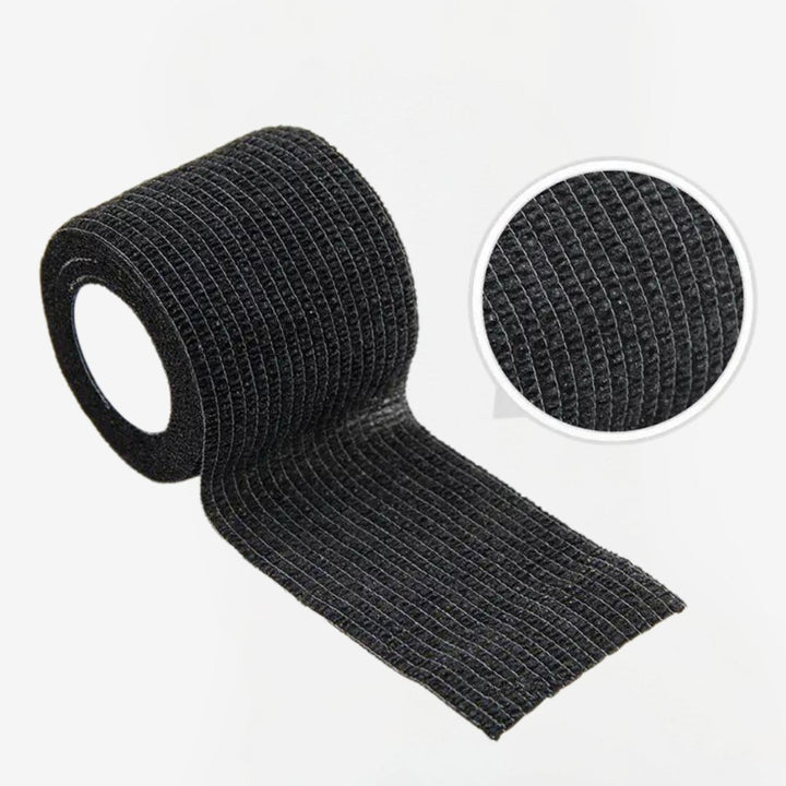 Durable black shin pad tape for secure hold in sports.